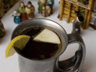 A cup of wassail, a warm mulled drink. A cup of wassail, a warm mulled drink.