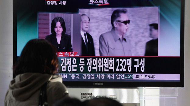 In Seoul today: South Koreans watch a television broadcast about the death of North Korean leader Kim Jong Il.