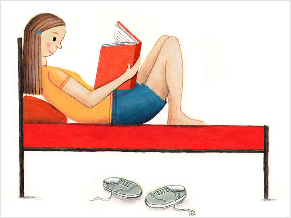 Teen reads a book Teen reads a book