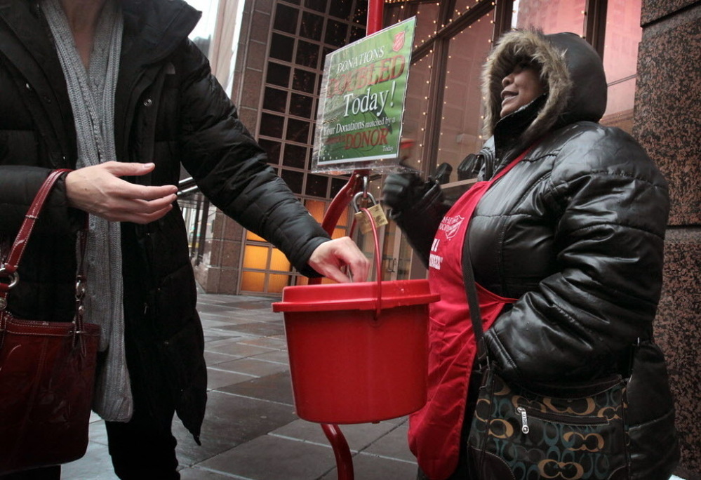 Antionette Levi solicits donations for the Salvation Army in Chicago. 