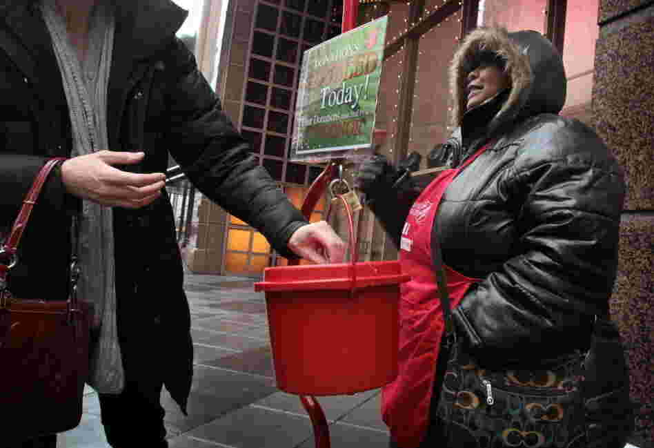 Antionette Levi solicits donations for the Salvation Army in Chicago. 