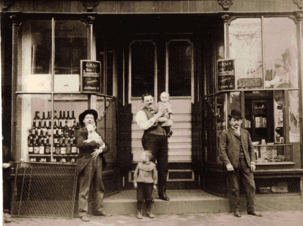 An early predecessor to the Hanukkah brews of today, Russian Jew Max Lapides stands with his sons in front of the Bauernschmidt Brewery Saloon in Baltimore, circa 1900. 