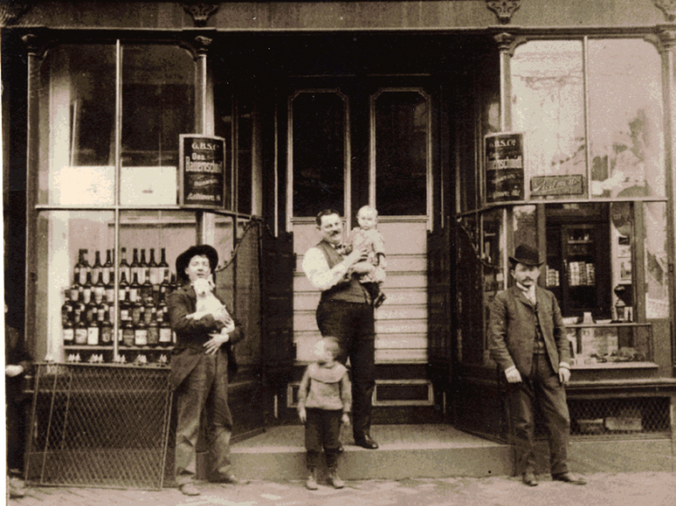 An early predecessor to the Hanukkah brews of today, Russian Jew Max Lapides stands with his sons in front of the Bauernschmidt Brewery Saloon in Baltimore, circa 1900. 