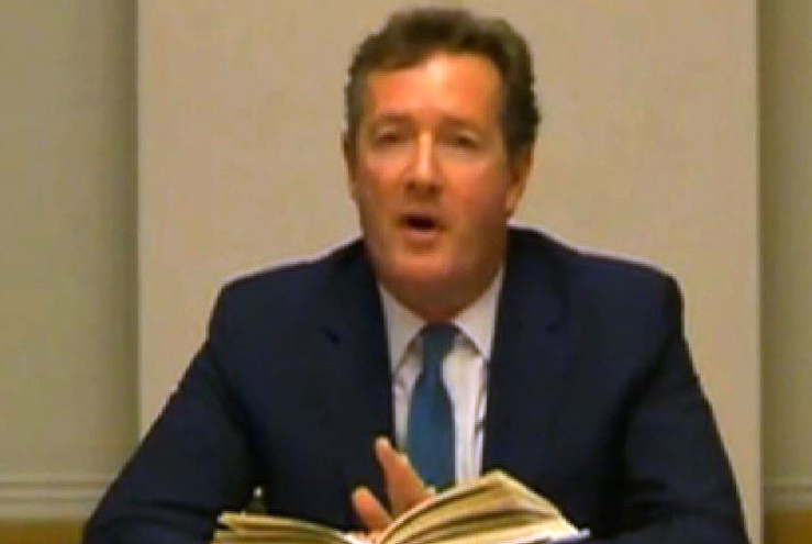 Former Daily Mirror and News of the World editor Piers Morgan gives evidence to the Leveson Inquiry in London.