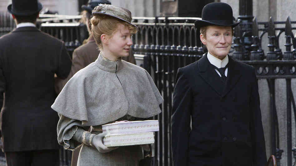 Mia Wasikowska (left) and Glenn Close are an unlikely couple in Albert Nobbs, a forlorn romance about a woman passing as a man to find work in 19th-century Ireland. Mia Wasikowska (left) and Glenn Close are an unlikely couple in Albert Nobbs, a forlorn romance about a woman passing as a man to find work in 19th-century Ireland.