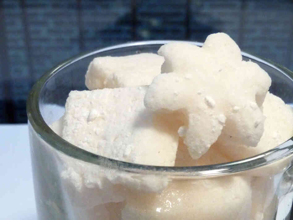 A mug of full of Traditional Vanilla Marshmallows cut into various shapes