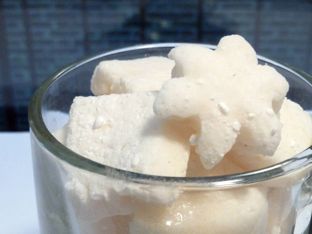 A mug of full of Traditional Vanilla Marshmallows cut into various shapes