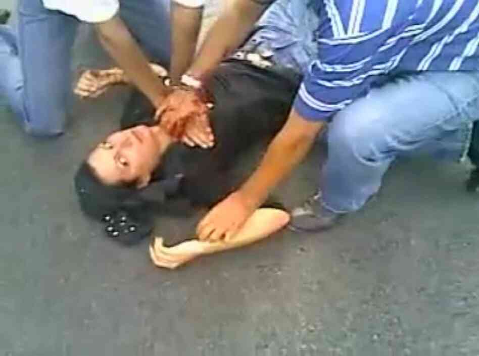 Neda Agha-Soltan lying on the ground after being shot in Tehran in 2009. Neda Agha-Soltan lying on the ground after being shot in Tehran in 2009.