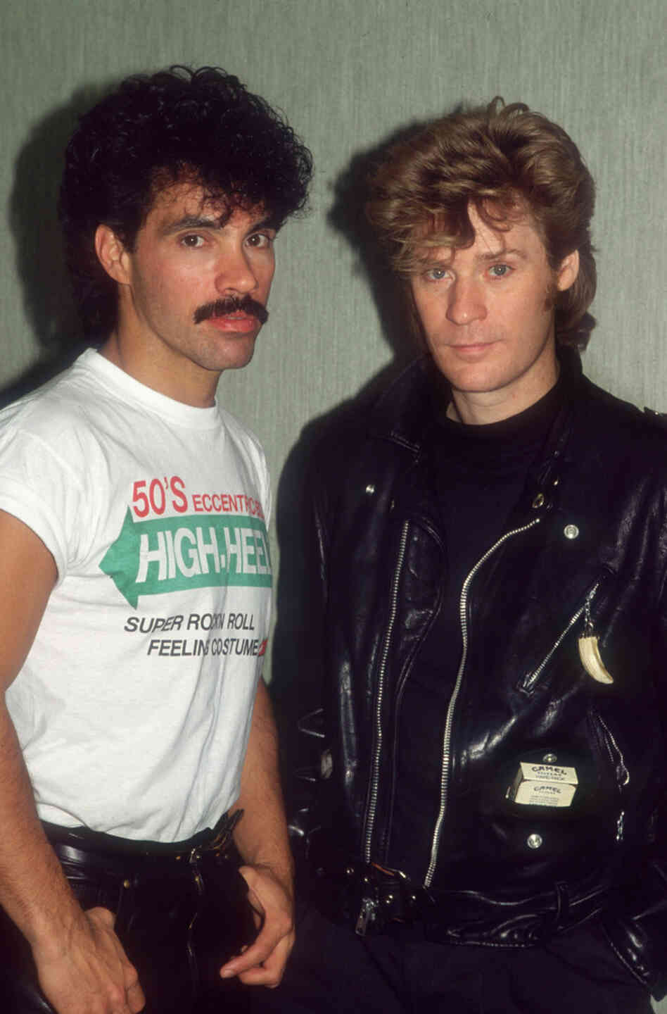 John Oates (left) and Daryl Hall (right) of pop duo Hall & Oates, seen here in 1987. These days, they're available on your phone.