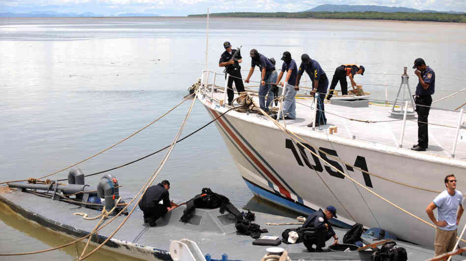 Costa Rican and U.S. Guard Coast members seized this  semi-submersible which was carrying seven tons of cocaine. It is shown here at Costa Rica's Puntarenas Coast Guard headquarters on Sept. 17, 2008. Four Colombians were arrested.