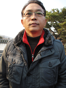 Son Jeong-hun, one of the rally's organizers, predicts that conflict among North Korea's elite factions will break out by early next year. Son Jeong-hun, one of the rally's organizers, predicts that conflict among North Korea's elite factions will break out by early next year.