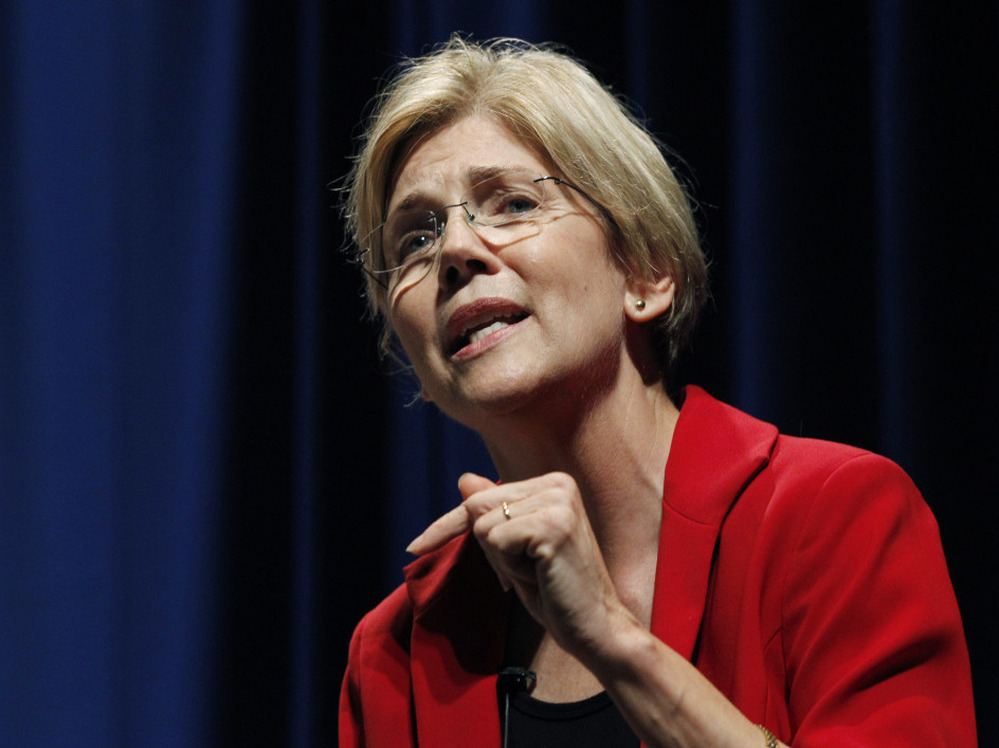 Elizabeth Warren speaks in October during a debate for the U.S. Senate seat in Massachusetts held by Republican Scott Brown. The race has become a contest of who is the "real" populist.