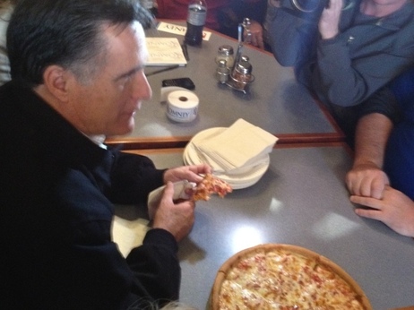 Romney eats a slice of pizza - this one with the cheese still on - at a campaign stop in Newport, N.H Romney eats a slice of pizza - this one with the cheese still on - at a campaign stop in Newport, N.H