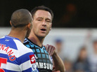 John Terry, right, and opponent Anton Ferdinand during the English Premier League on Oct. 23 in which it's alleged that Terry hurled a racial slur at Ferdinand. Terry denies doing that. He's going to face criminal charges. John Terry, right, and opponent Anton Ferdinand during the English Premier League on Oct. 23 in which it's alleged that Terry hurled a racial slur at Ferdinand. Terry denies doing that. He's going to face criminal charges.