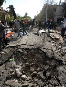A crater left by an explosion at the site of a suicide attack today in Damascus. A crater left by an explosion at the site of a suicide attack today in Damascus.
