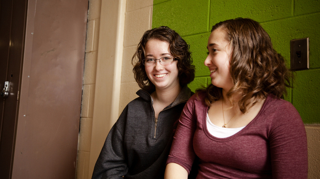 Laurel Fontaine, 16, (left) and her twin sister Heather. When Laurel was 11 years old, she suffered a stroke that destroyed 80 percent of the left side of her brain. The singing therapy helped her regain the ability to speak.