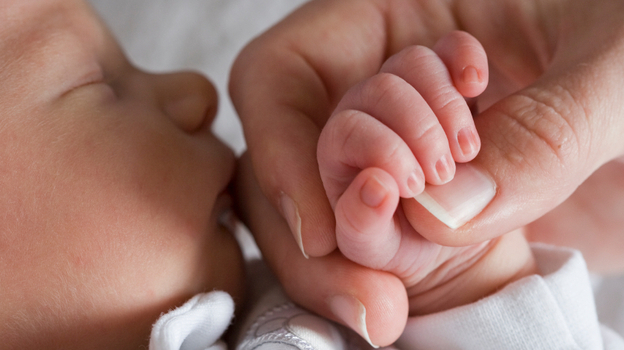 Should she know that this moment was made possible by an egg donor?