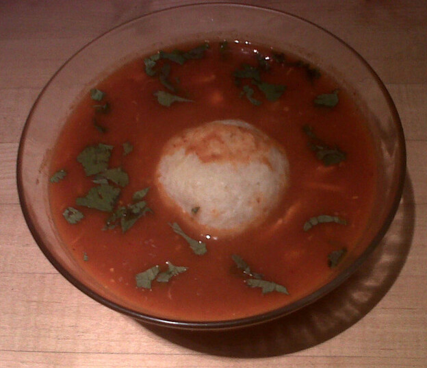 The pozole with matzo balls soup contains hints of chili, tomato and hominy. 