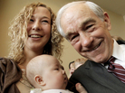 Rep. Ron Paul poses with a mother and her 3-month-old daughter in Dubuque, Iowa, Thursday, Dec. 22, 2011. Rep. Ron Paul poses with a mother and her 3-month-old daughter in Dubuque, Iowa, Thursday, Dec. 22, 2011.