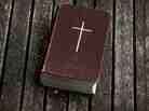 A worn copy of the Bible. A worn copy of the Bible.