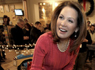 In a last bout of campaigning before Christmas, Rep. Michele Bachmann of Minnesota signs autographs at the National Motorcycle Museum in Anamosa, Iowa, on Dec. 22. In a last bout of campaigning before Christmas, Rep. Michele Bachmann of Minnesota signs autographs at the National Motorcycle Museum in Anamosa, Iowa, on Dec. 22.