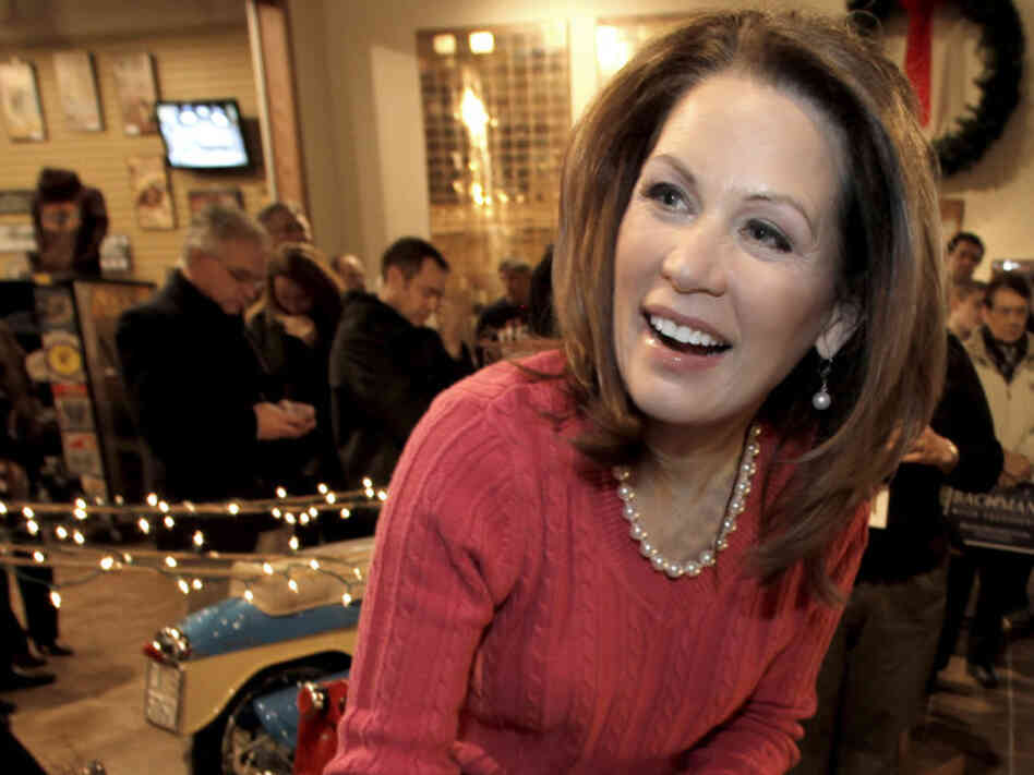 In a last bout of campaigning before Christmas, Rep. Michele Bachmann of Minnesota signs autographs at the National Motorcycle Museum in Anamosa, Iowa, on Dec. 22.