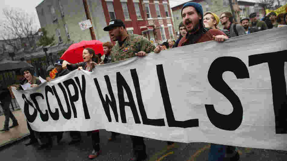  Occupy Wall Street protesters march through in an impoverished community in Brooklyn to protest home foreclosures. Many see the movement's dynamic strategies and aims as key to its success. 