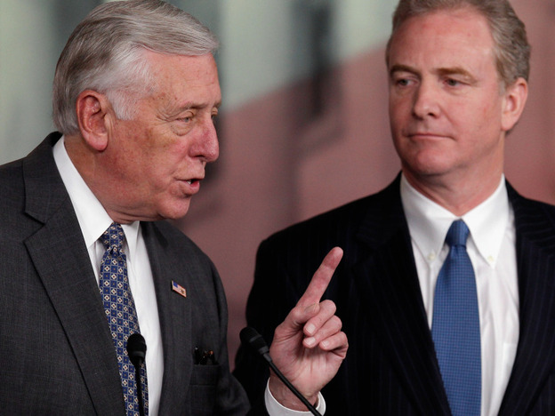 House Minority Whip Steny Hoyer answers reporters' questions about the House's inability to pass a payroll tax cut extension. At right is Democratic Rep. Chris Van Hollen of Maryland.