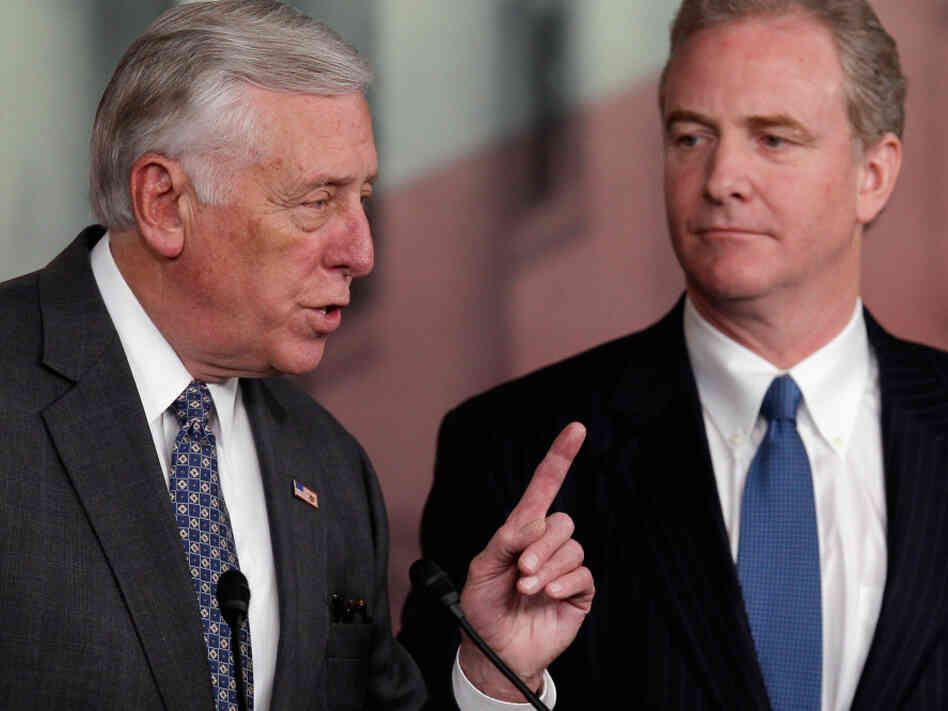 House Minority Whip Steny Hoyer answers reporters' questions about the House's inability to pass a payroll tax cut extension. At right is Democratic Rep. Chris Van Hollen of Maryland.
