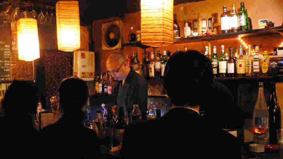 At Vow's Bar in Tokyo, Buddhist monks run the place and serve up advice along with cocktails. Here's a monk serving drinks on Monday. 