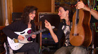 Sharon Isbin (left) and Steve Vai switch axes. Sharon Isbin (left) and Steve Vai switch axes.