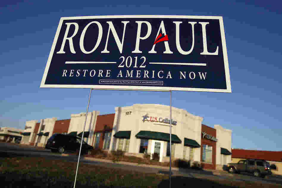 A campaign sign for Republican presidential candidate U.S. Rep. Ron Paul of Texas sits at an intersection in Ankeny, Iowa on Dec. 27. 