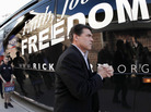 Texas Gov. Rick Perry walks to his bus after a campaign stop at the Glenn Miller Museum in Clarinda, Iowa on Dec. 27. Texas Gov. Rick Perry walks to his bus after a campaign stop at the Glenn Miller Museum in Clarinda, Iowa on Dec. 27.