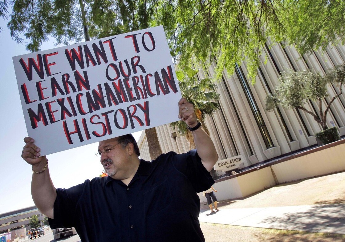 Carlos Galindo protests in support of Tucson's ethnic studies program in May. 