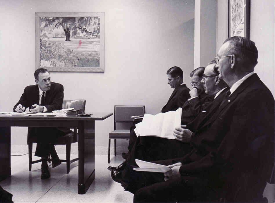 Wallace Kuralt (left), the head of the Mecklenburg County welfare program in North Carolina, speaks to the Welfare Board in 1962. The county sterilized 485 people — about three times more than any other in the state. More than 7,000 people were sterilized in North Carolina. Wallace Kuralt (left), the head of the Mecklenburg County welfare program in North Carolina, speaks to the Welfare Board in 1962. The county sterilized 485 people — about three times more than any other in the state. More than 7,000 people were sterilized in North Carolina.