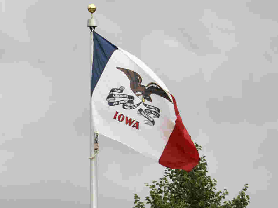The Iowa flag flies in Newton, Iowa. The Iowa flag flies in Newton, Iowa.