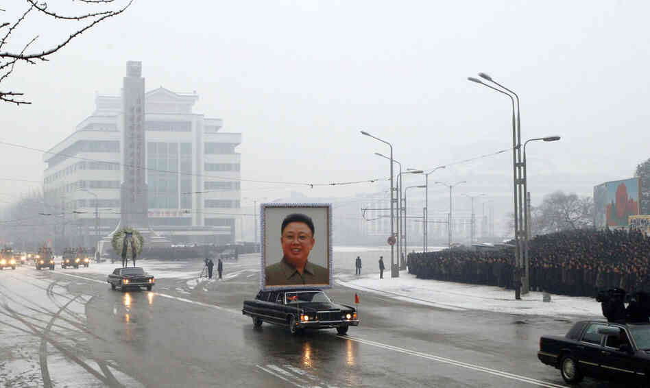The funeral procession for North Korea's late leader Kim Jong Il arrives at the square of the Kumsusan Memorial Palace in the capital Pyongyang. 