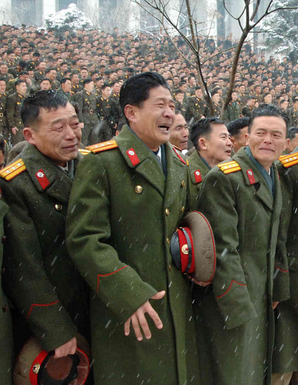 North Korean soldiers react during their late leader Kim Jong Il's funeral procession in Pyongyang on Dec. 28. 