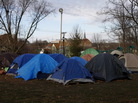 An Occupy camp at College Green Park in Iowa City, Iowa. The camp was mostly empty aside from three men. An Occupy camp at College Green Park in Iowa City, Iowa. The camp was mostly empty aside from three men.