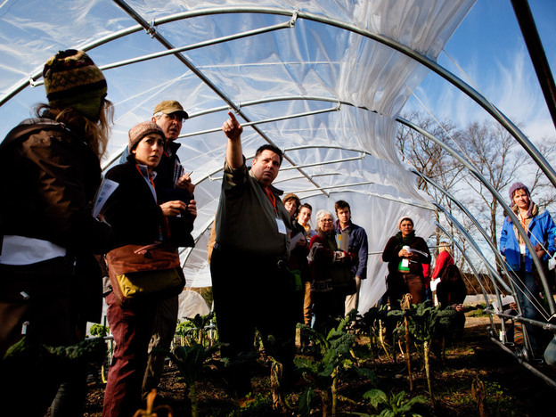 Adam Lemieuy, from Johnny's Selected Seeds, leads a caterpillar tunnel workshop at the 2011 Young Farmers conference at Stone Barns Center for Food and Agriculture in Tarrytown, NY.