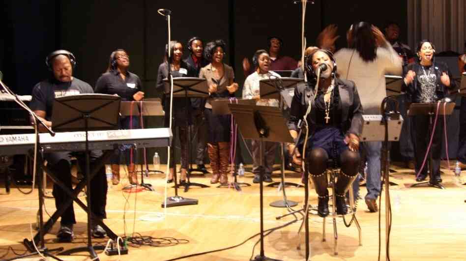 Sounds of Blackness founder Gary Hines (left) and vocalist Jamecia Bennett, perform with the Howard University Gospel Choir at NPR headquarters in Washington, D.C. Sounds of Blackness founder Gary Hines (left) and vocalist Jamecia Bennett, perform with the Howard University Gospel Choir at NPR headquarters in Washington, D.C.