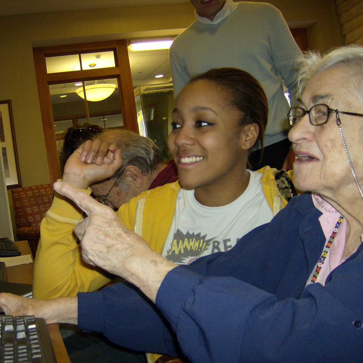 At Pace University in New York, college students who tutor seniors in local retirement homes are prepped with sensitivity training. Brittany Beckett (left), a Pace student, and Muriel Cohen work together at United Hebrew of New Rochelle. 