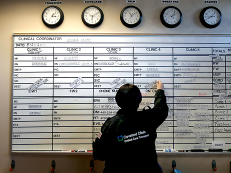 Rachel Zayas, a registered nurse, sets up the shift board for the night shift at the Cleveland Clinic. Rachel Zayas, a registered nurse, sets up the shift board for the night shift at the Cleveland Clinic.