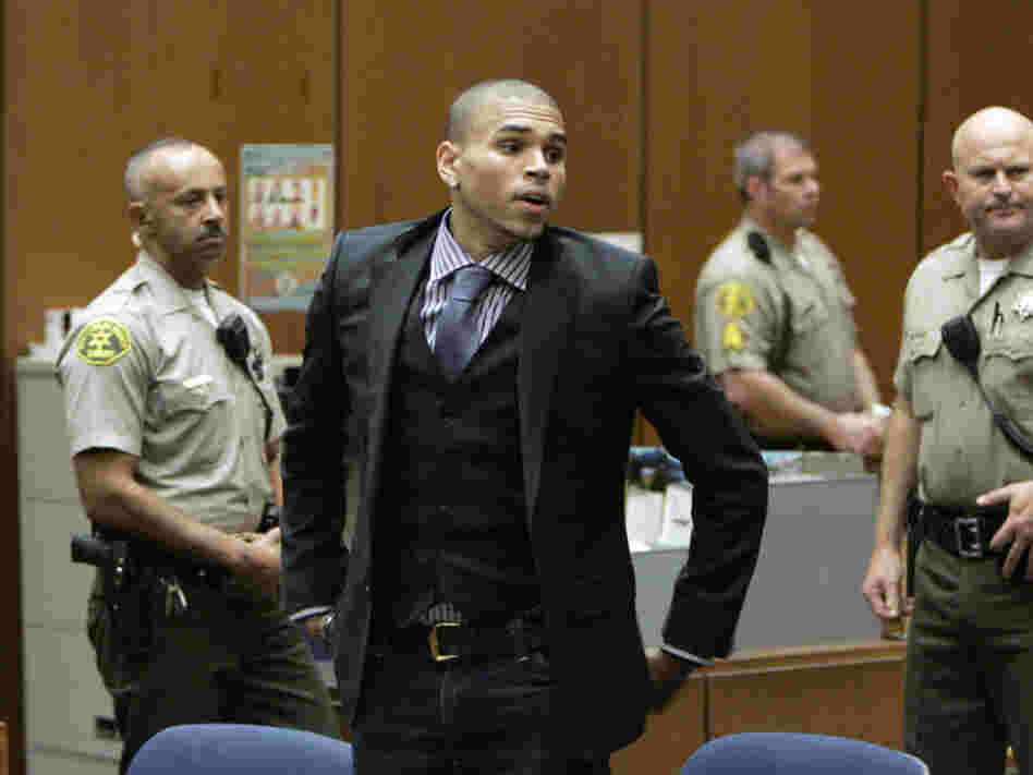 Chris Brown prepares to leave court after a hearing in Los Angeles in November 2009, to offer a judge his first progress report since being sentenced for beating ex-girlfriend Rihanna earlier that year. 