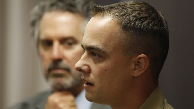 Marine Staff Sgt. Frank Wuterich talks to the media with his attorney Neal Puckett (left) watching on after a 2010 pretrial hearing at Camp Pendleton in California. Wuterich is charged with voluntary manslaughter in the deaths of 24 Iraqi civilians in 2005. Marine Staff Sgt. Frank Wuterich talks to the media with his attorney Neal Puckett (left) watching on after a 2010 pretrial hearing at Camp Pendleton in California. Wuterich is charged with voluntary manslaughter in the deaths of 24 Iraqi civilians in 2005.