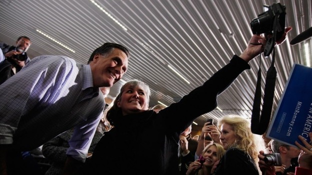 Republican presidential contender Mitt Romney campaigning in Ames, Iowa, on Thursday (Dec. 29, 2011).