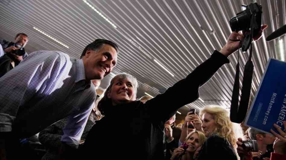 Republican presidential contender Mitt Romney campaigning in Ames, Iowa, on Thursday (Dec. 29, 2011).