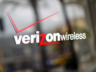 The window of a Verizon store in Los Angeles. The window of a Verizon store in Los Angeles.