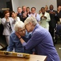 Phyllis Siegel (right) kisses her wife, Connie Kopelov, after the two exchanged vows at the Manhattan City Clerk's office. The couple were the first same-sex pair to tie the knot in New York City after the state's Marriage Equality Act went into effect on July 24. 