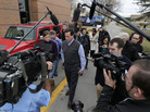 Rick Santorum with news media after a campaign stop in Indianola, Iowa. Rick Santorum with news media after a campaign stop in Indianola, Iowa.